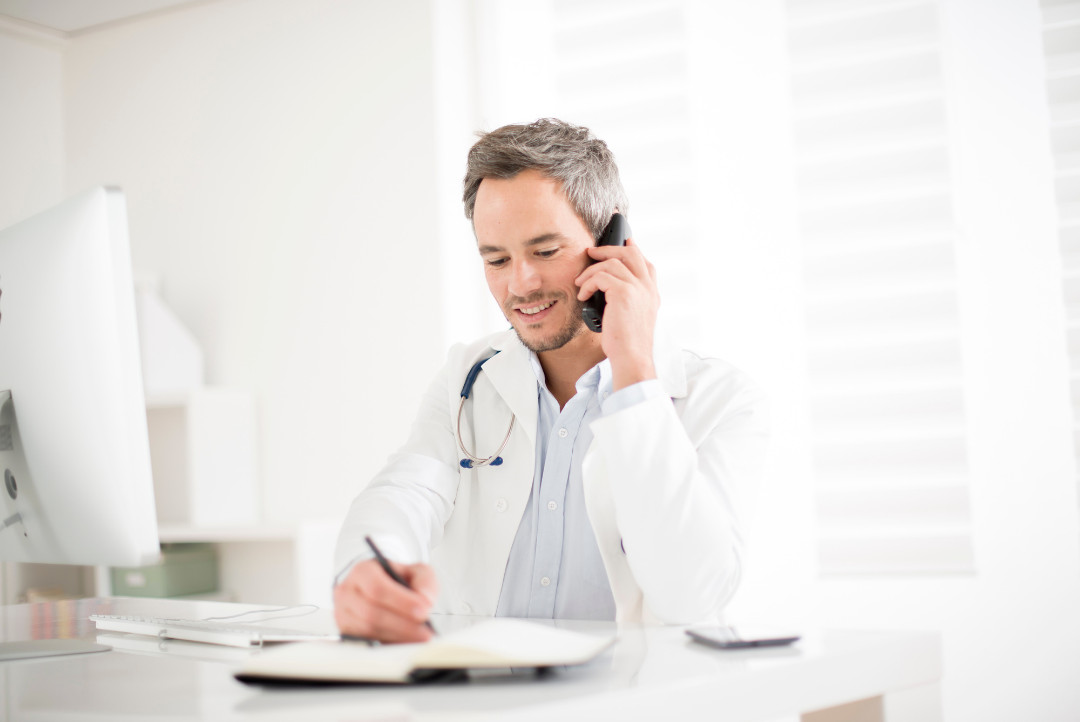 doctor calling companies for information on medical billing